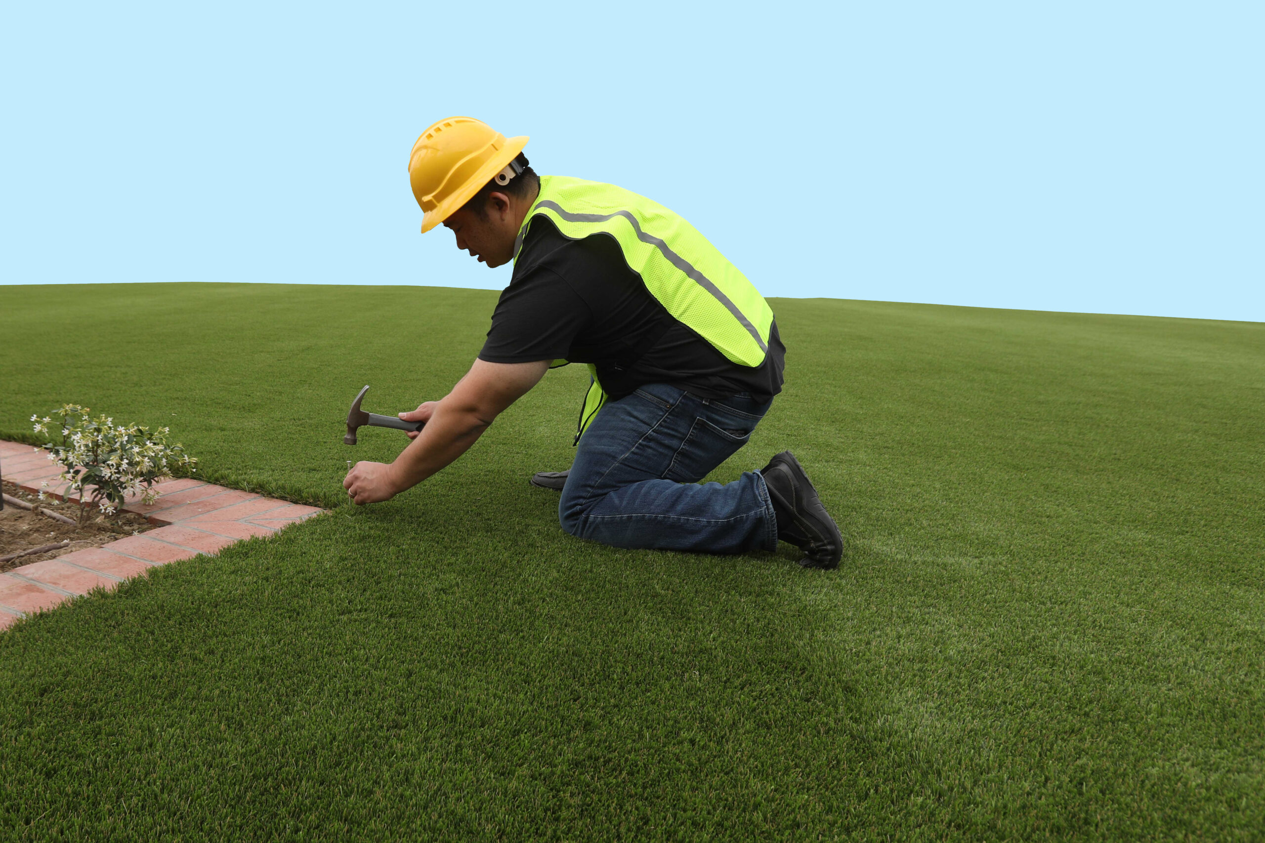 Man installing Turf